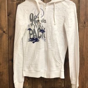 White Nevada Wolf Pack sweatshirt.
